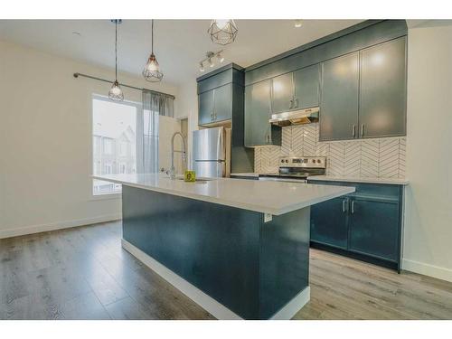 151 Livingston Common Ne, Calgary, AB - Indoor Photo Showing Kitchen With Upgraded Kitchen