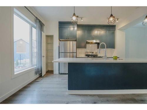 151 Livingston Common Ne, Calgary, AB - Indoor Photo Showing Kitchen With Upgraded Kitchen