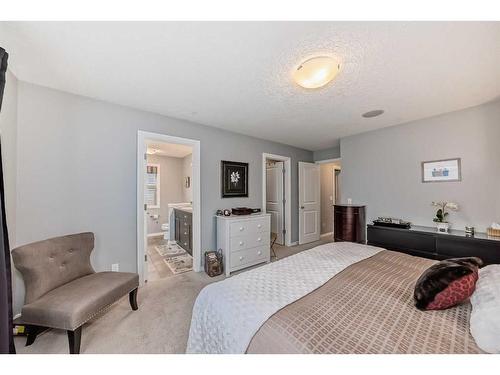 338 Kings Heights Drive Se, Airdrie, AB - Indoor Photo Showing Bedroom