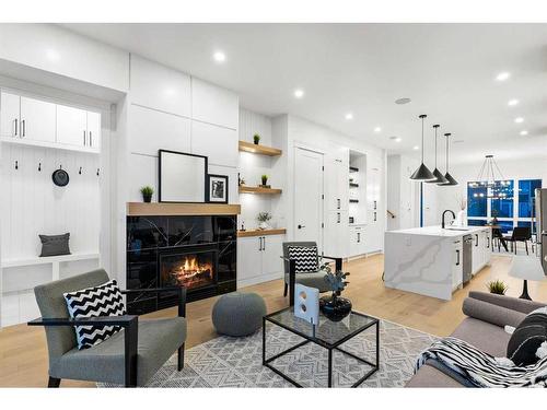 1818 19 Avenue Nw, Calgary, AB - Indoor Photo Showing Living Room With Fireplace