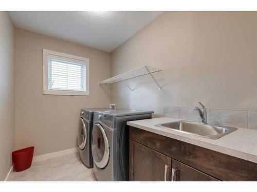 8 West Grove Bay Sw, Calgary, AB - Indoor Photo Showing Laundry Room