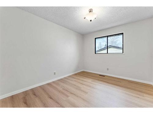 12 Glenport Road, Cochrane, AB - Indoor Photo Showing Other Room