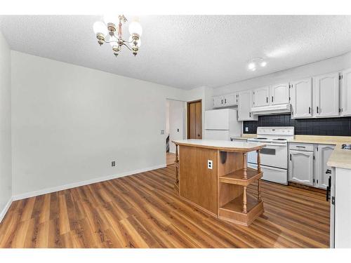 12 Glenport Road, Cochrane, AB - Indoor Photo Showing Kitchen