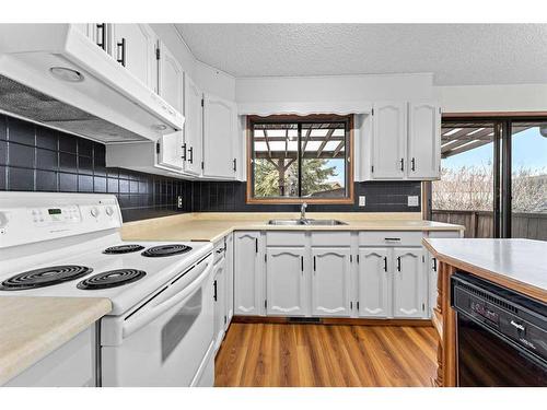 12 Glenport Road, Cochrane, AB - Indoor Photo Showing Kitchen With Double Sink