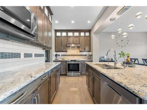 201 Aspenmere Way, Chestermere, AB - Indoor Photo Showing Kitchen With Stainless Steel Kitchen With Double Sink With Upgraded Kitchen