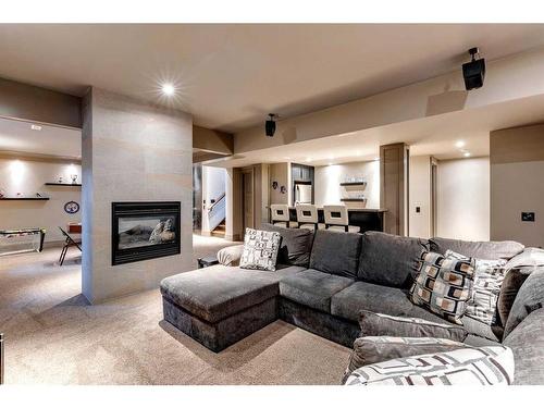 140 35 Street Nw, Calgary, AB - Indoor Photo Showing Living Room With Fireplace