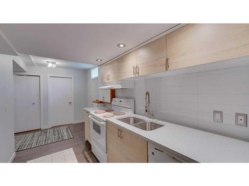 84 Templevale Way Ne, Calgary, AB - Indoor Photo Showing Kitchen With Double Sink