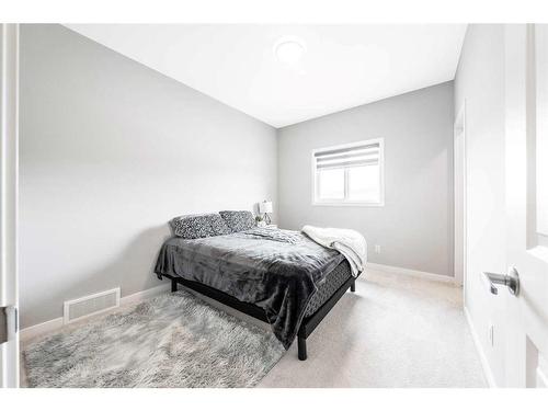 28 Walgrove Landing Se, Calgary, AB - Indoor Photo Showing Bedroom