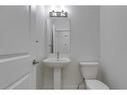 70 Saddlebred Place, Cochrane, AB  - Indoor Photo Showing Bathroom 