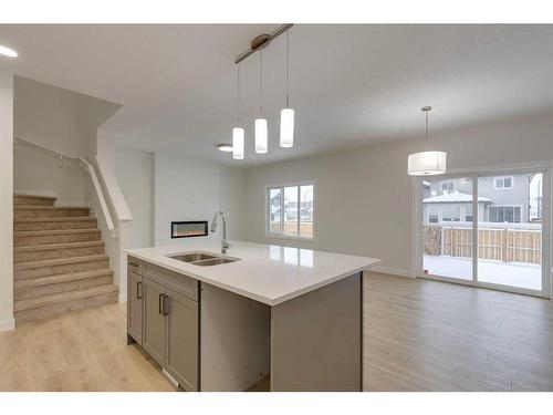 70 Saddlebred Place, Cochrane, AB - Indoor Photo Showing Kitchen With Double Sink