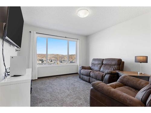 716 River Heights Crescent, Cochrane, AB - Indoor Photo Showing Living Room