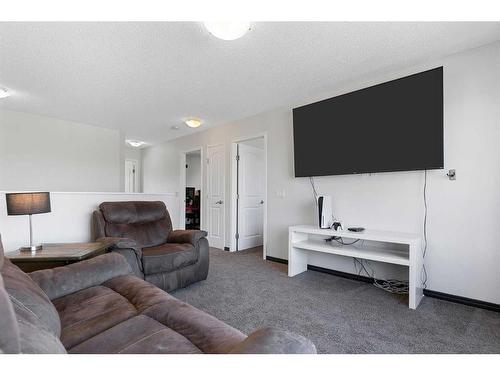 716 River Heights Crescent, Cochrane, AB - Indoor Photo Showing Living Room