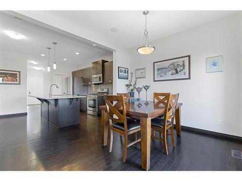 716 River Heights Crescent, Cochrane, AB - Indoor Photo Showing Dining Room