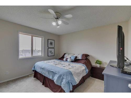 96 Prestwick Acres Lane Se, Calgary, AB - Indoor Photo Showing Bedroom