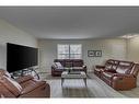 96 Prestwick Acres Lane Se, Calgary, AB  - Indoor Photo Showing Living Room 