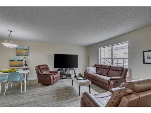 96 Prestwick Acres Lane Se, Calgary, AB - Indoor Photo Showing Living Room