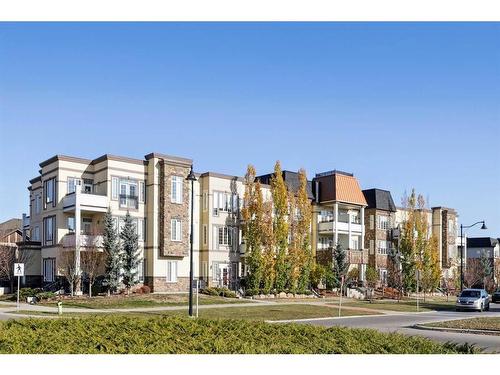 311-39 Quarry Gate Se, Calgary, AB - Outdoor With Facade