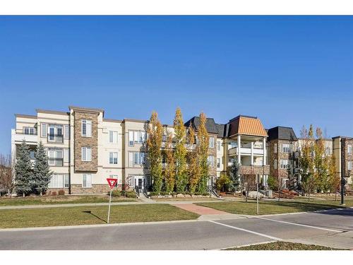 311-39 Quarry Gate Se, Calgary, AB - Outdoor With Facade