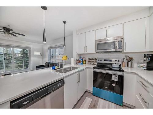 5102-302 Skyview Ranch Drive Ne, Calgary, AB - Indoor Photo Showing Kitchen With Stainless Steel Kitchen With Double Sink