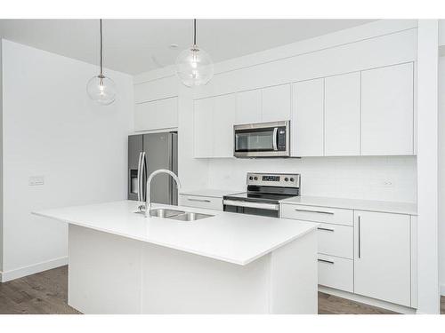 1305-60 Skyview Ranch Road Ne, Calgary, AB - Indoor Photo Showing Kitchen With Stainless Steel Kitchen With Double Sink With Upgraded Kitchen