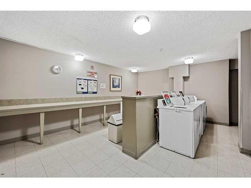 330-820 89 Avenue Sw, Calgary, AB - Indoor Photo Showing Laundry Room