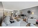 330-820 89 Avenue Sw, Calgary, AB  - Indoor Photo Showing Living Room 