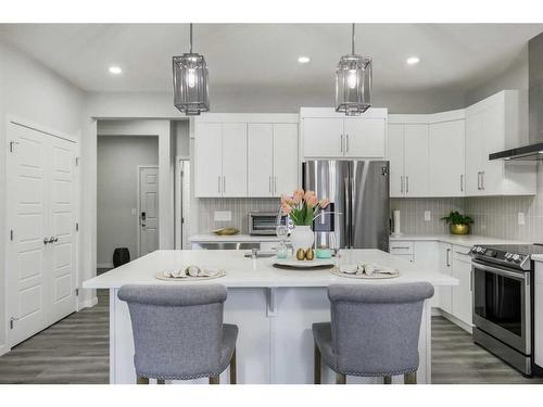 70 Seton Road Se, Calgary, AB - Indoor Photo Showing Kitchen With Stainless Steel Kitchen With Upgraded Kitchen