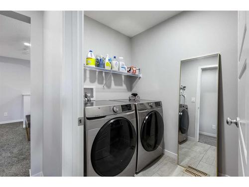 70 Seton Road Se, Calgary, AB - Indoor Photo Showing Laundry Room