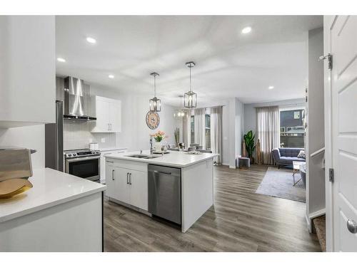 70 Seton Road Se, Calgary, AB - Indoor Photo Showing Kitchen With Double Sink With Upgraded Kitchen