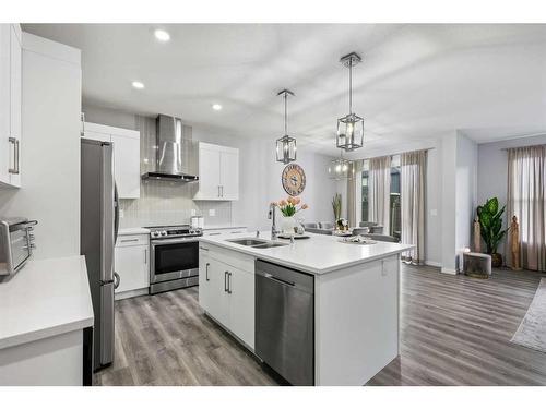 70 Seton Road Se, Calgary, AB - Indoor Photo Showing Kitchen With Stainless Steel Kitchen With Double Sink With Upgraded Kitchen