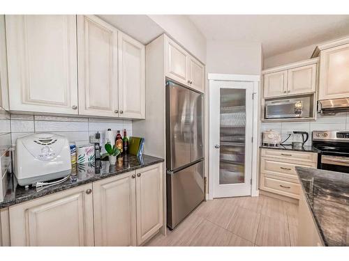 82 Sherwood Road Nw, Calgary, AB - Indoor Photo Showing Kitchen With Stainless Steel Kitchen