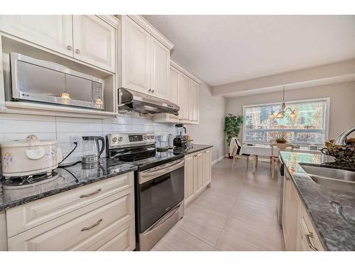 82 Sherwood Road Nw, Calgary, AB - Indoor Photo Showing Kitchen With Double Sink