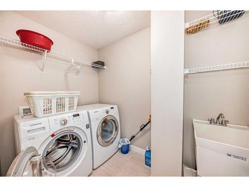 82 Sherwood Road Nw, Calgary, AB - Indoor Photo Showing Laundry Room