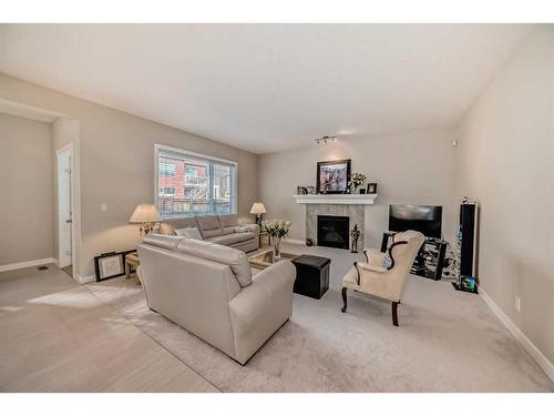 82 Sherwood Road Nw, Calgary, AB - Indoor Photo Showing Living Room With Fireplace