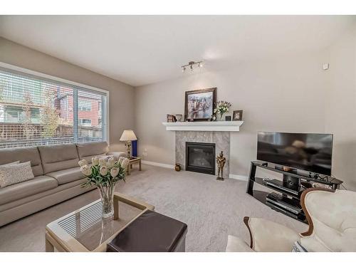 82 Sherwood Road Nw, Calgary, AB - Indoor Photo Showing Living Room With Fireplace