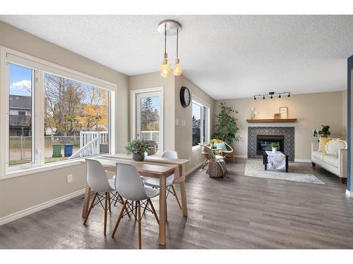 71 Tipping Close Se, Airdrie, AB - Indoor With Fireplace