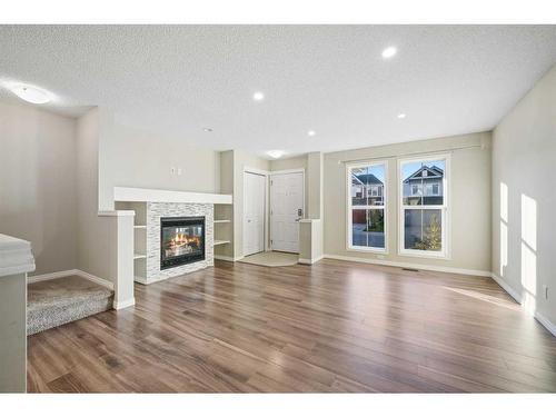 176 Auburn Meadows Boulevard Se, Calgary, AB - Indoor Photo Showing Living Room With Fireplace