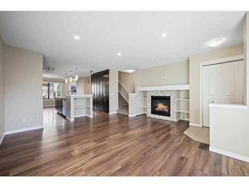 176 Auburn Meadows Boulevard Se, Calgary, AB - Indoor Photo Showing Living Room With Fireplace