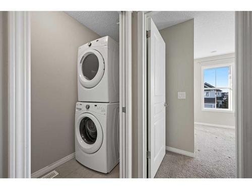 176 Auburn Meadows Boulevard Se, Calgary, AB - Indoor Photo Showing Laundry Room