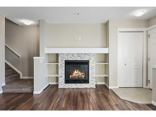 176 Auburn Meadows Boulevard Se, Calgary, AB - Indoor Photo Showing Living Room With Fireplace