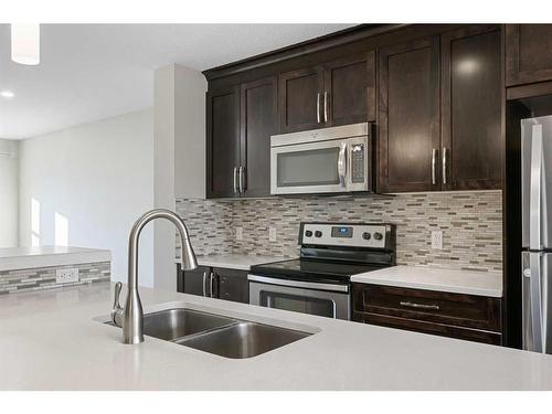 176 Auburn Meadows Boulevard Se, Calgary, AB - Indoor Photo Showing Kitchen With Stainless Steel Kitchen With Double Sink With Upgraded Kitchen