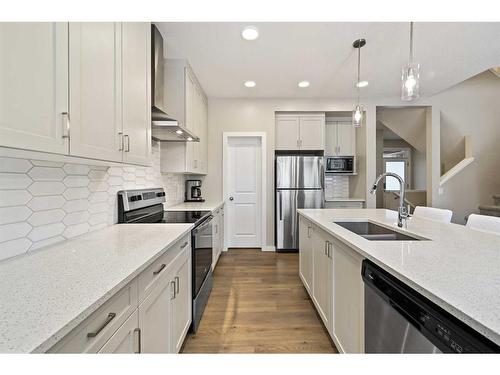 618 Kingsmere Way Se, Airdrie, AB - Indoor Photo Showing Kitchen With Stainless Steel Kitchen With Double Sink With Upgraded Kitchen