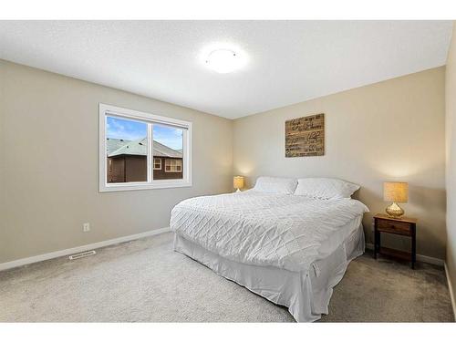 618 Kingsmere Way Se, Airdrie, AB - Indoor Photo Showing Bedroom