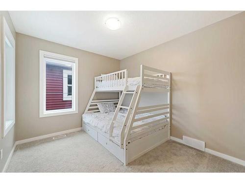 618 Kingsmere Way Se, Airdrie, AB - Indoor Photo Showing Bedroom