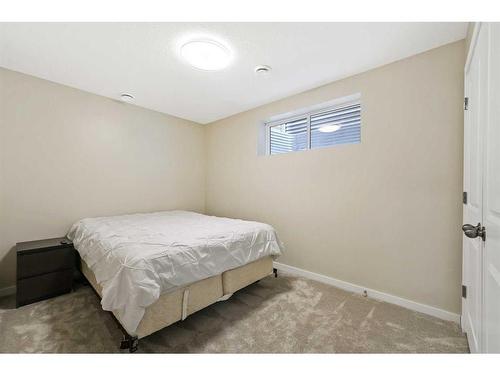 618 Kingsmere Way Se, Airdrie, AB - Indoor Photo Showing Bedroom