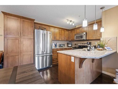 1310-450 Sage Valley Drive Nw, Calgary, AB - Indoor Photo Showing Kitchen With Stainless Steel Kitchen