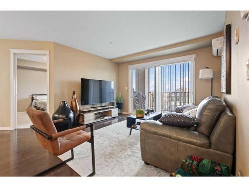 1310-450 Sage Valley Drive Nw, Calgary, AB - Indoor Photo Showing Living Room