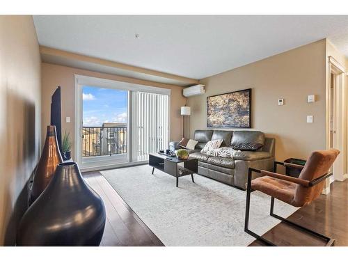 1310-450 Sage Valley Drive Nw, Calgary, AB - Indoor Photo Showing Living Room