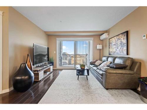 1310-450 Sage Valley Drive Nw, Calgary, AB - Indoor Photo Showing Living Room