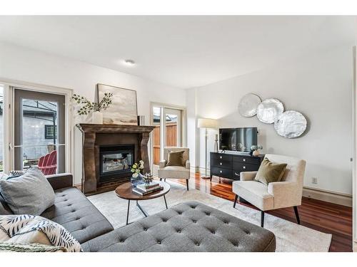 2532 3 Avenue Nw, Calgary, AB - Indoor Photo Showing Living Room With Fireplace